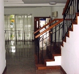 Split level living and dining area in grey marble