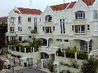 Terrace houses are behind this row of semi-detached 