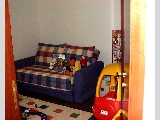 3rd bedroom is a study room or playroom.  Sofa bed for guests. 