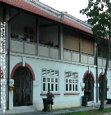 Playing with grandchild at the Townerville colonial houses, Singapore 