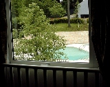 Pool seen from upper floor bedroom