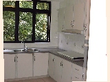 Hume Park I - kitchen is next to the green trees