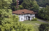 Black and white bungalows have a romantic appeal to Caucasians