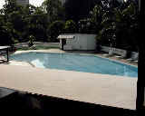 Bay windows from bedroom. Big pool for 47 families only.