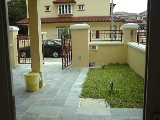 Mera Gardens terrace house's car porch