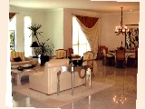 Spacious living and dining areas in the 3200 sq. ft apartment.