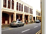 Quiet Niven Road with pretty shophomes.