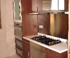 St Martin Residence: Kitchen fitted with white Corian countertop 