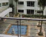 Tranquil courtyard near children's pool and gym (left)