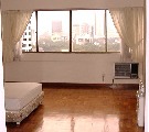 The Cairnhill. Old fashioned air conditioners in spacious master bedroom but rent is low.